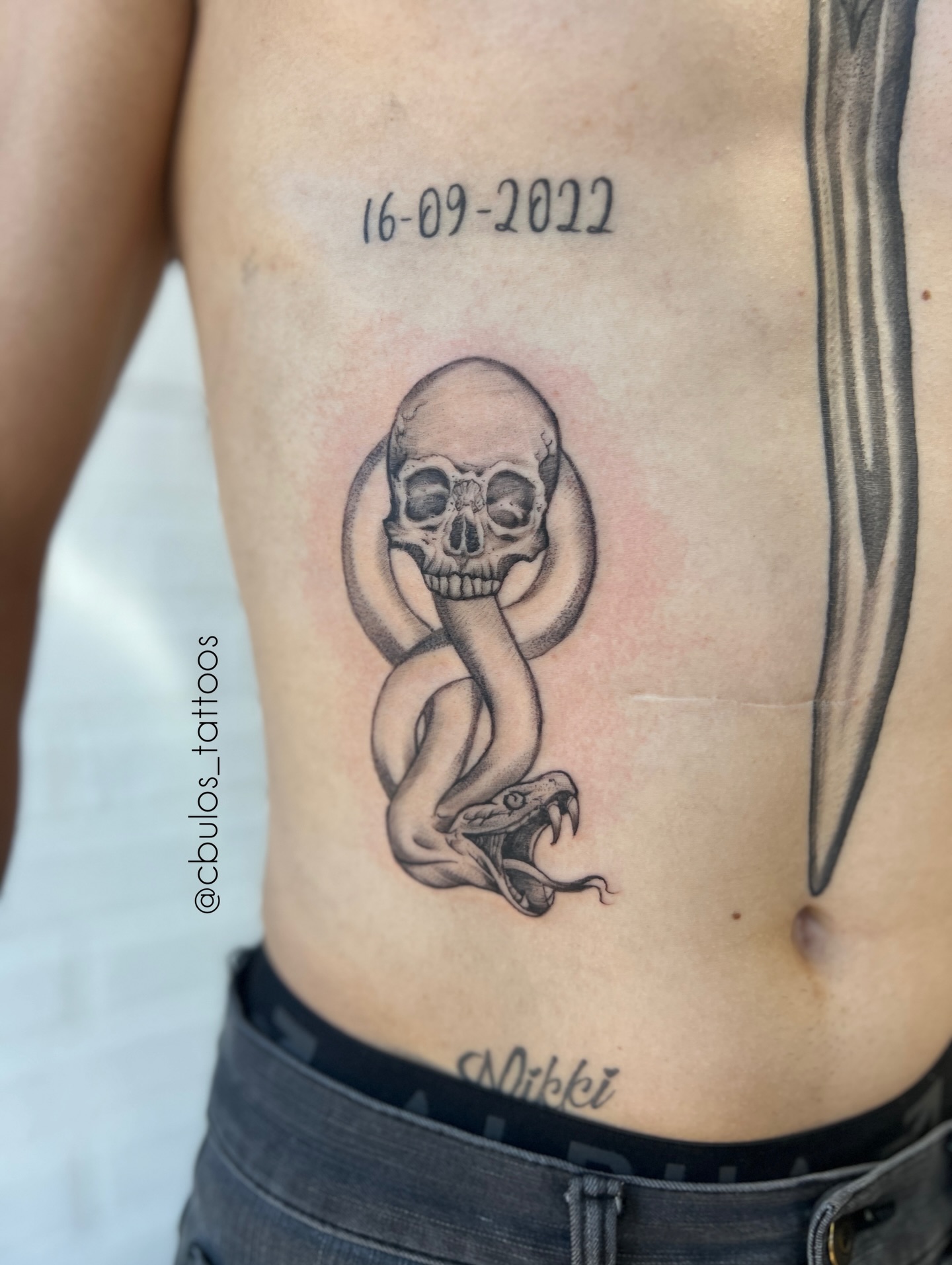 Skull & serpent — ribs